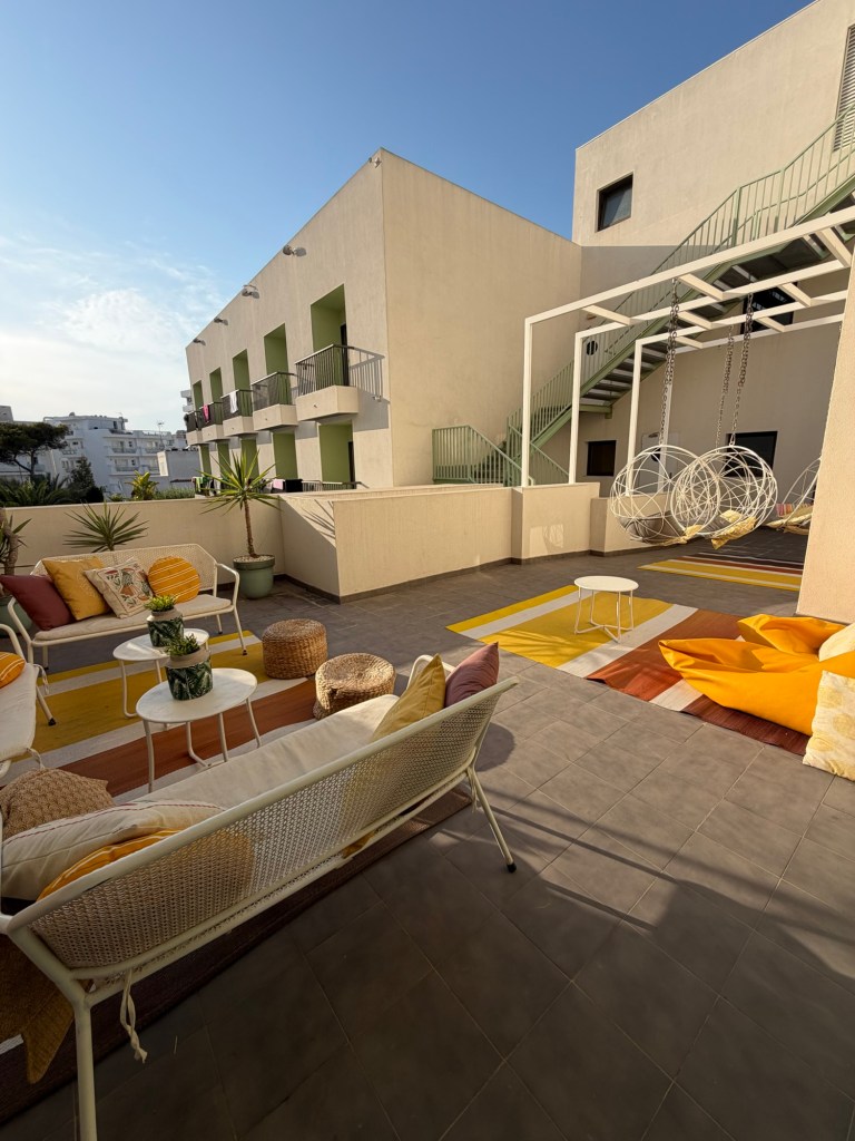 Common area at Amistat Island Hostel in San Antonio, Ibiza