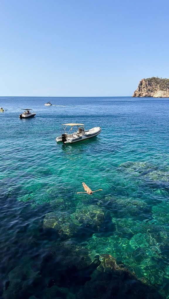Holly swimming in the Mediterranean Sea during an Ibiza boat tour
